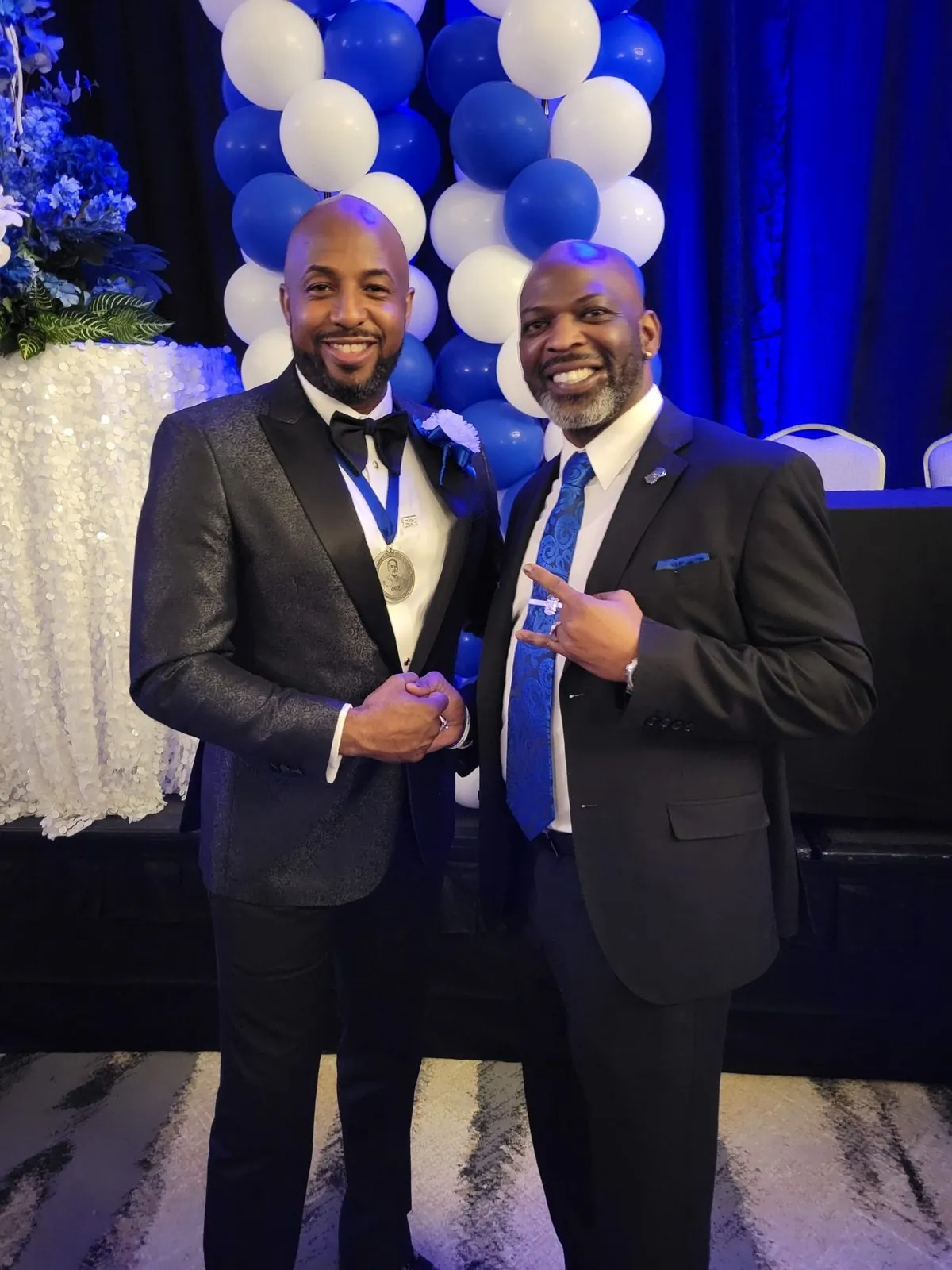 A brother receiving a medal at a chapter awards ceremony