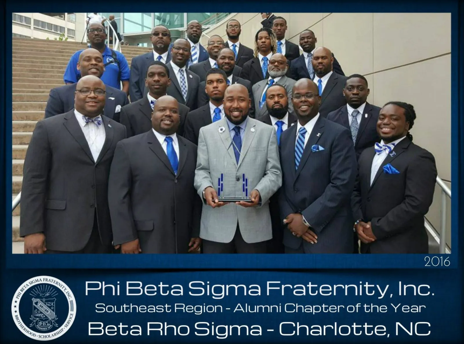 Chapter brothers with the chapter banner