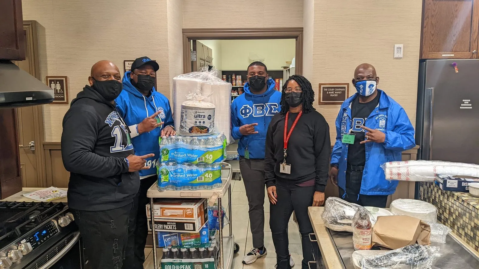 Brothers collecting supplies for a community donation drive
